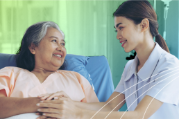 A nurse caring for an older patient